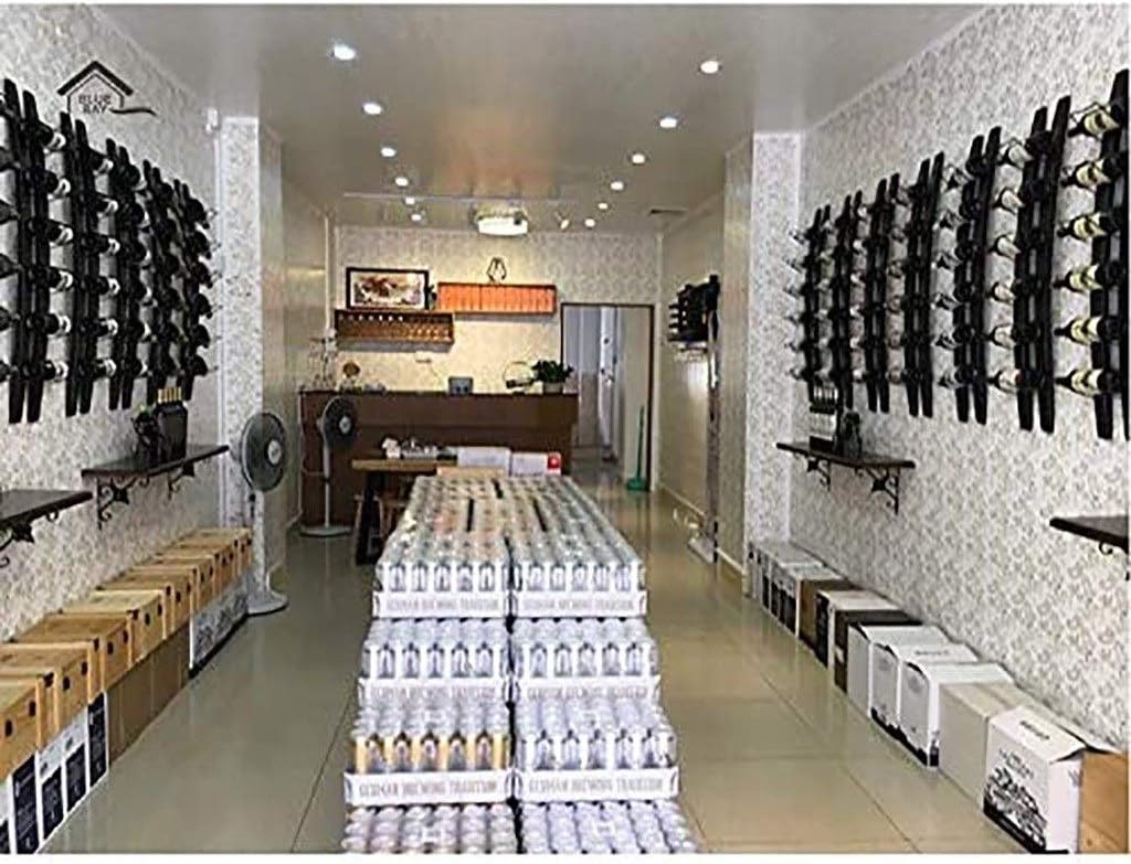630 Bottle Wall-Mounted Wine Rack with Rustic Wood Finish